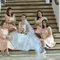 THE BRIDE WITH HER GROOM AND ENTOURAGE by Peter Lim