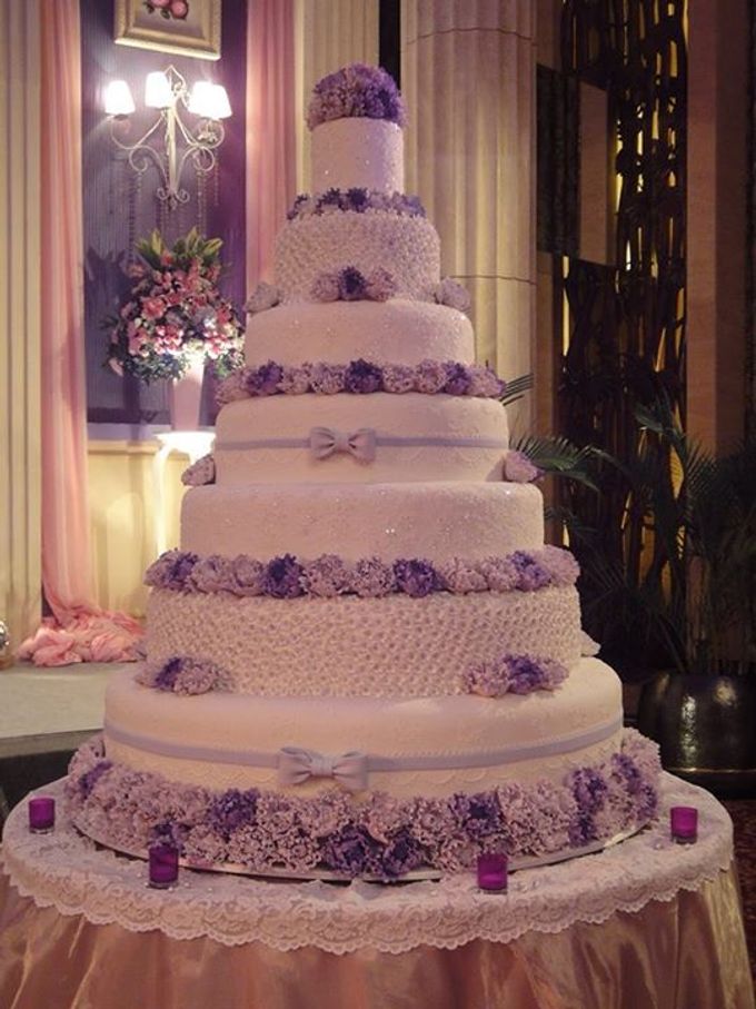 7 tiers Wedding Cake by LeNovelle Cake | Bridestory.com