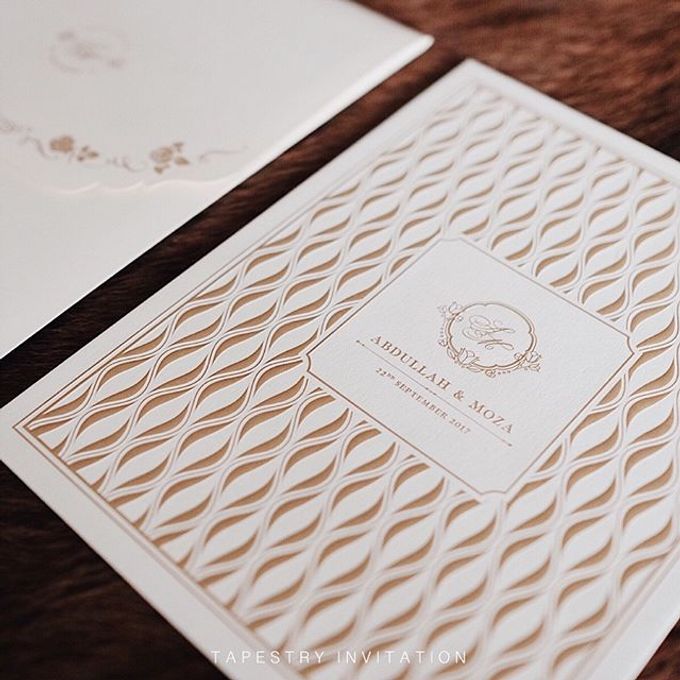 A simple yet elegant gold on creme invitation for our client in a far away country by Tapestry Invitation - 002