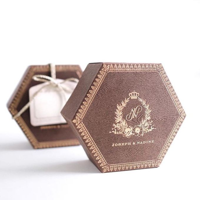 A flower themed holy matrimony invitation wrapped neatly in a hexagonal box for Joseph & Nadine by Tapestry Invitation - 003