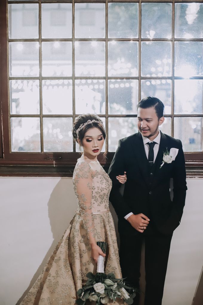 Dhiny & Yoga Wedding at Gedung Arsip Nasional by Mirza Photography - 011