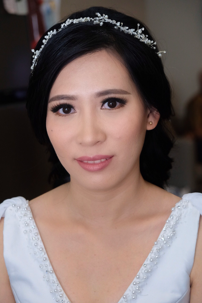 Wedding day makeup for Ms. Yani by Erliana Lim Makeup Artist - 001