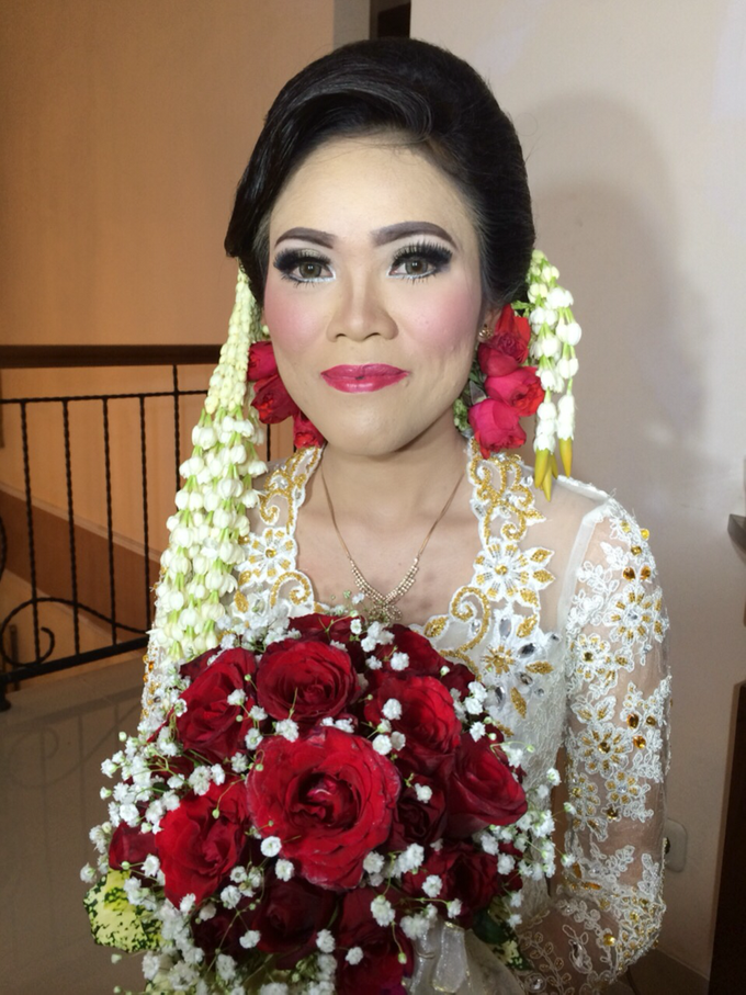 Makeup pengantin Batak 10-9-2016 by lettazel makeup | Bridestory.com