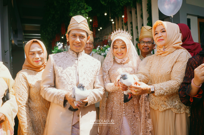 Ellya + Ryan - Wedding Day Reception by Photolagi.id - 002